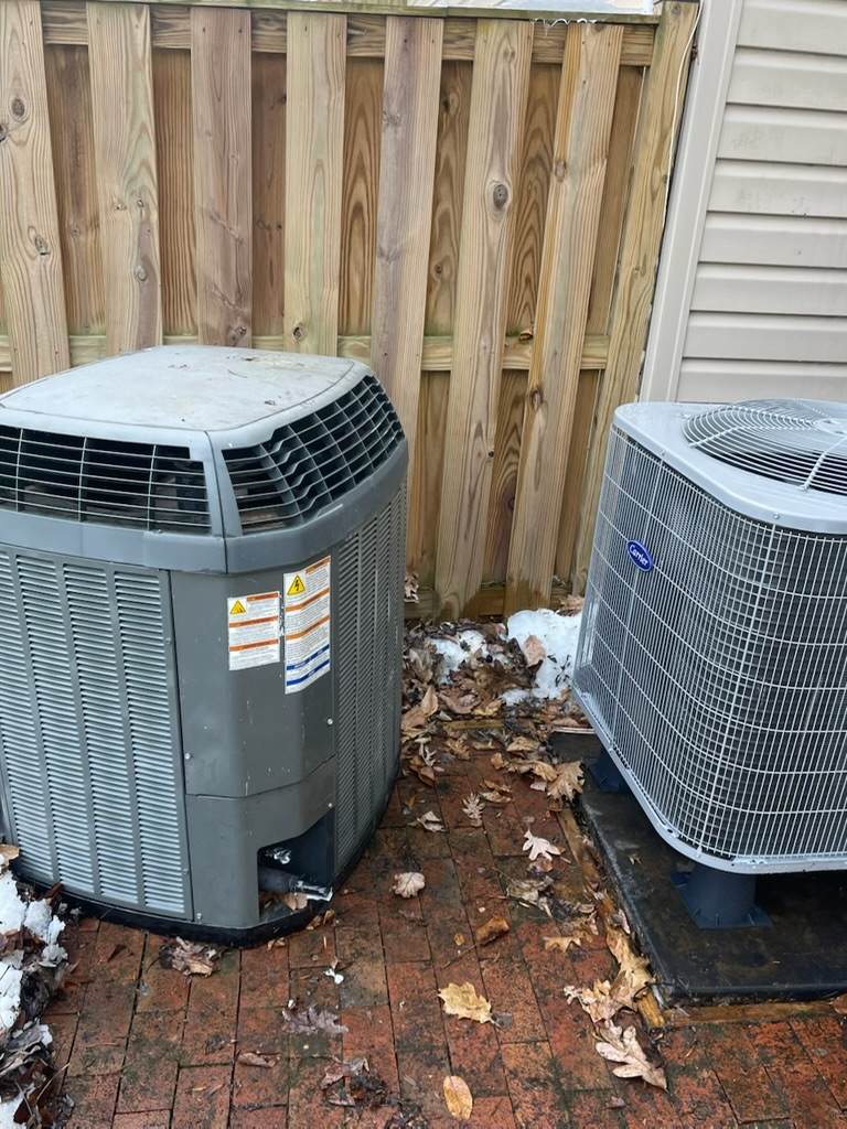Completed MajorHVAC recent work depicting a heat pump removed from outdoor residential property replaced with carrier all in 1 condensor and heat pump