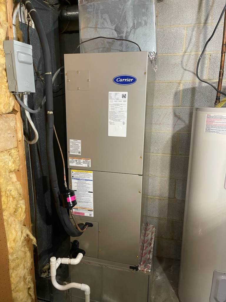 Carrier air handler installed in hard to reach utility space