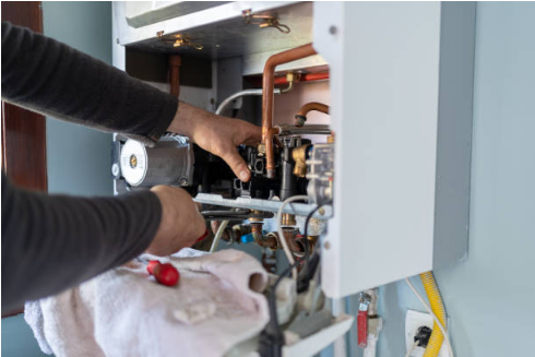 Close-up furnace inspection image representing maintenance and tune-up work.